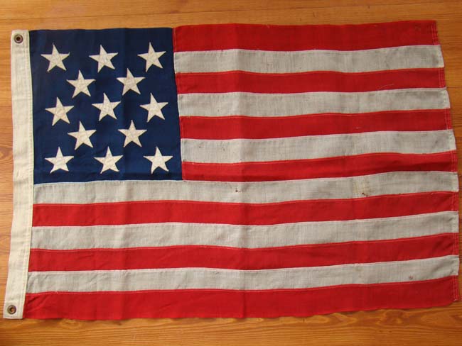 A hand stitched woolen flag made for the Centennial in 1876